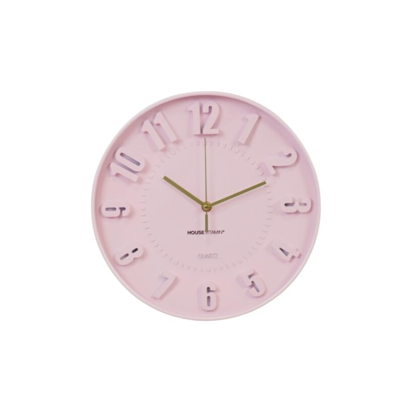 Ihastuttava vaaleanpunainen kello tuo väriä ja iloa sisustukseen