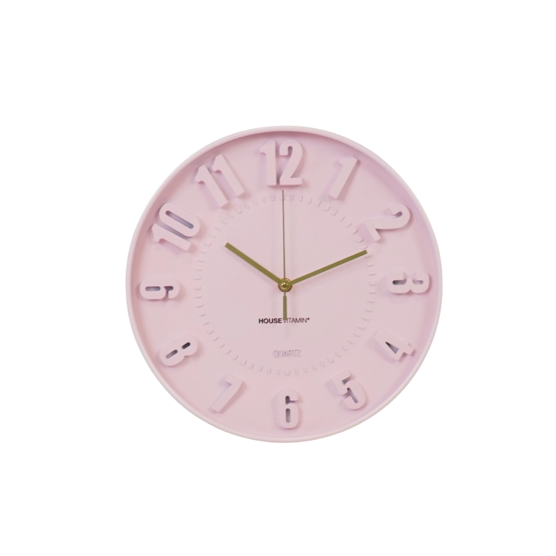 Ihastuttava vaaleanpunainen kello tuo väriä ja iloa sisustukseen